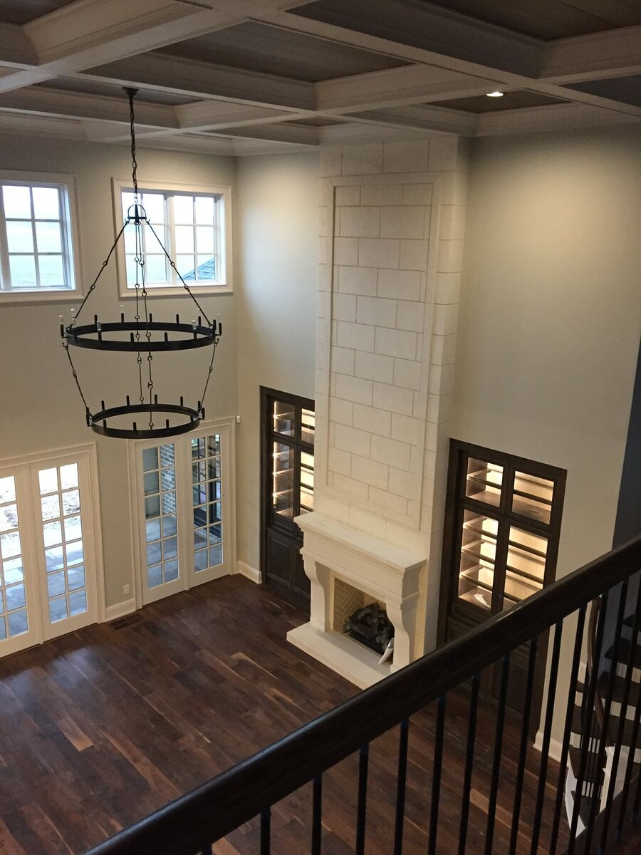 Great room with custom lighting wired by Ensign Electric